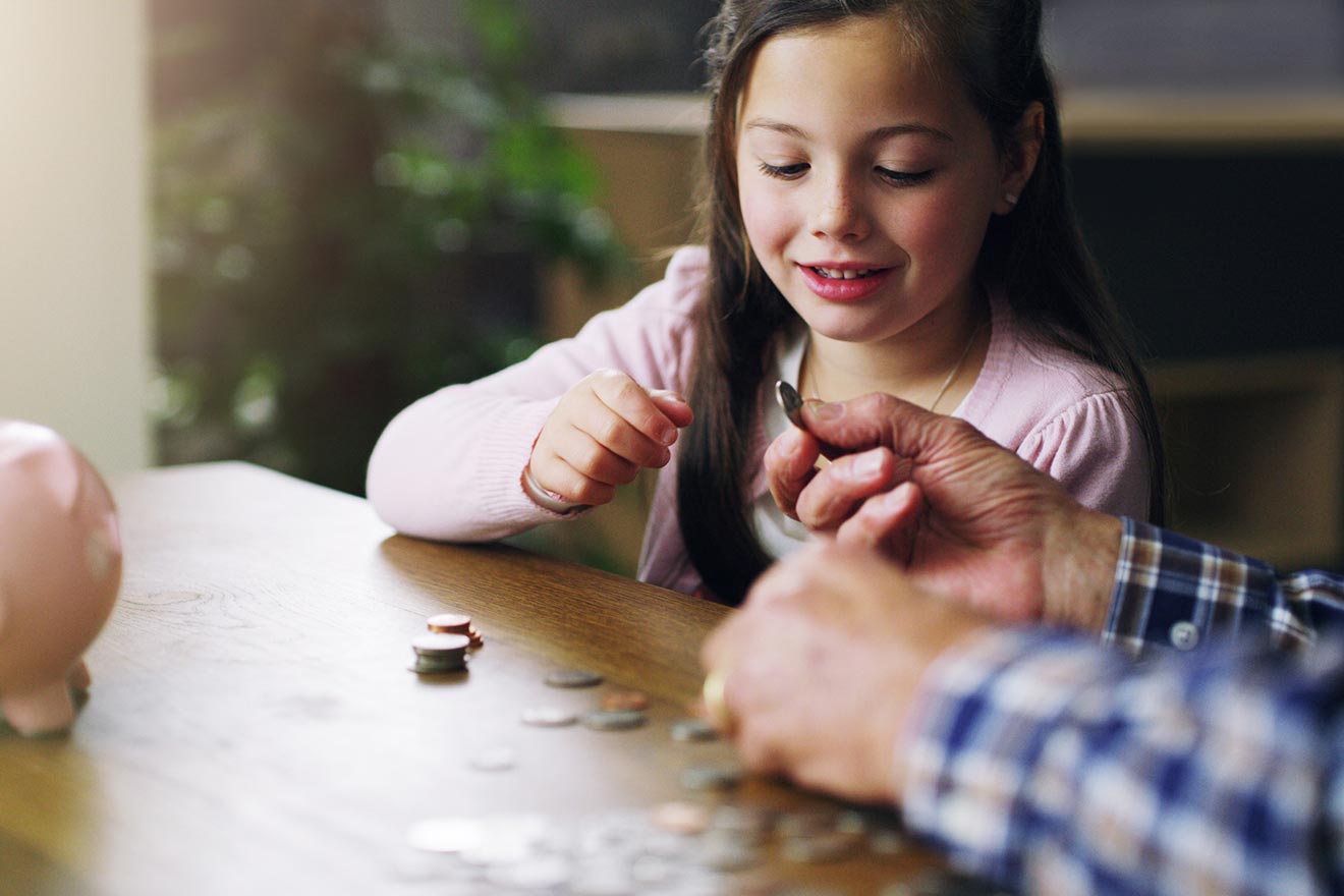 little girl counting change
