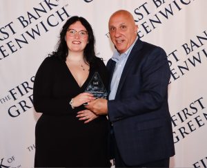 Emma Barhydt with Frank Gaudio and her Infi Award
