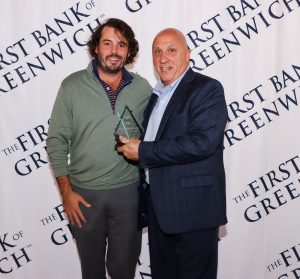 Remy Cook with his Infi Award and Frank Gaudio