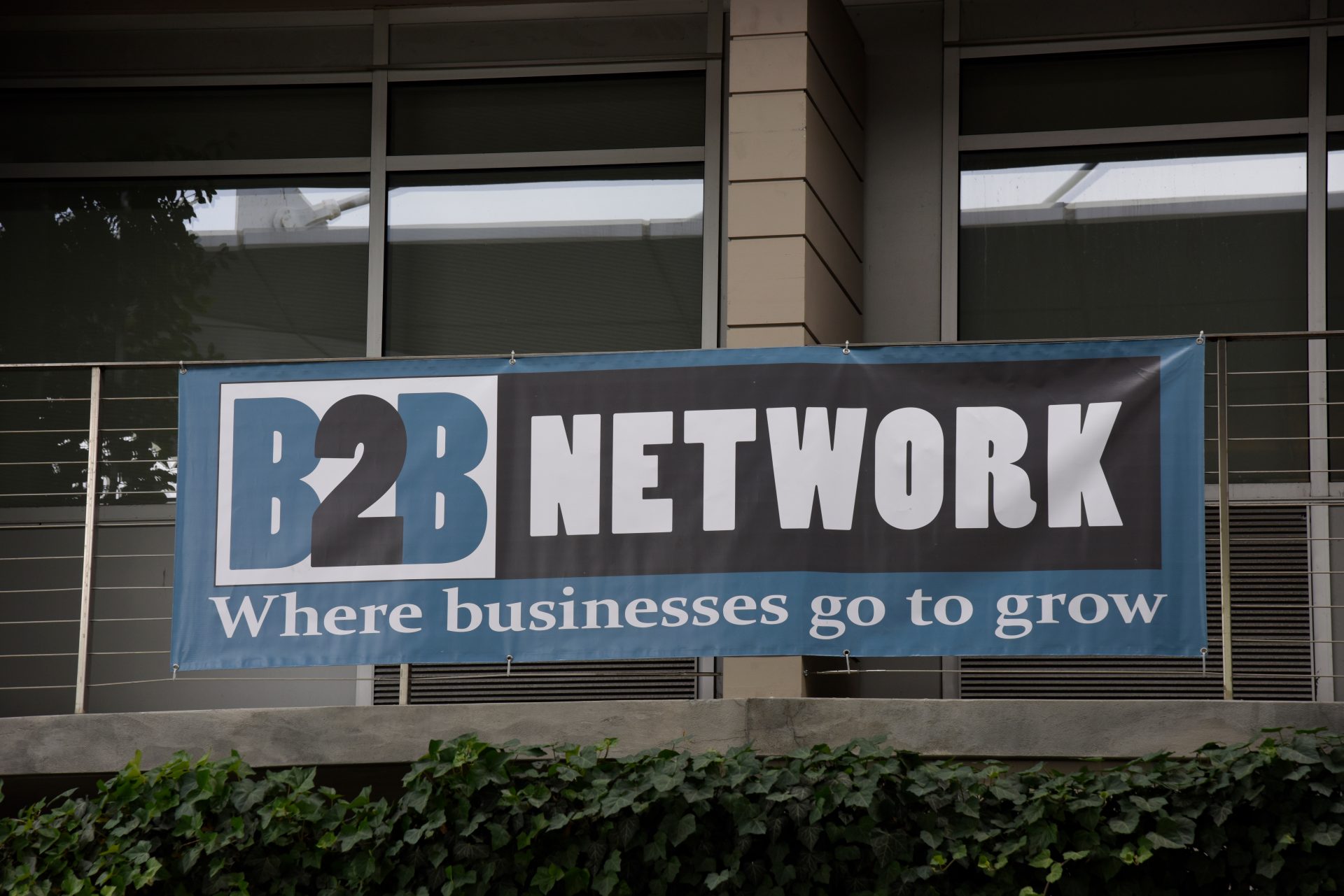 B2B Network banner hanging on outside balcony