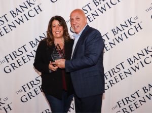 Robin Selden with Frank Gaudio and her Infi Award