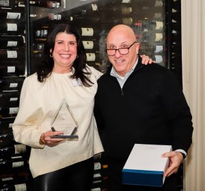 Rachel Shorten with Frank Gaudio and her Infi Award