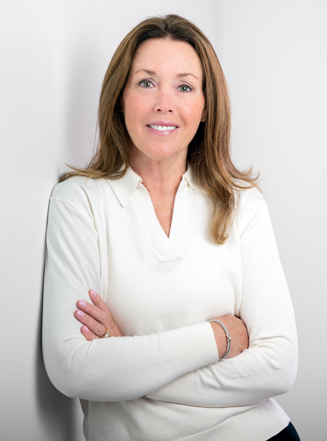 An image of Brenda L. Curcio, the Bank's SVP, Senior Operation/Information Security Officer, smiling in front of a white background with her arms crossed.