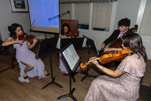 Emma Maini and the other talented members of the Young Artists Philharmonic members perform at last Monday’s Young Artists Philharmonic fundraiser event.