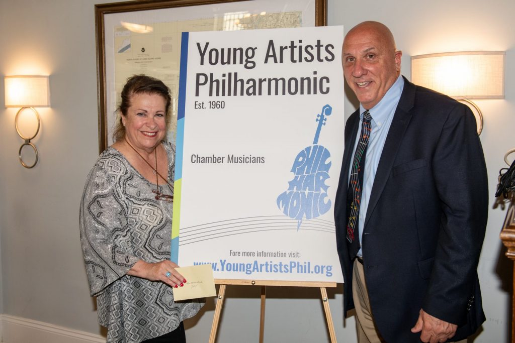 Maria Stich, Orchestra Administrator and Treasurer of the Young Artists Philharmonic and Frank Gaudio.