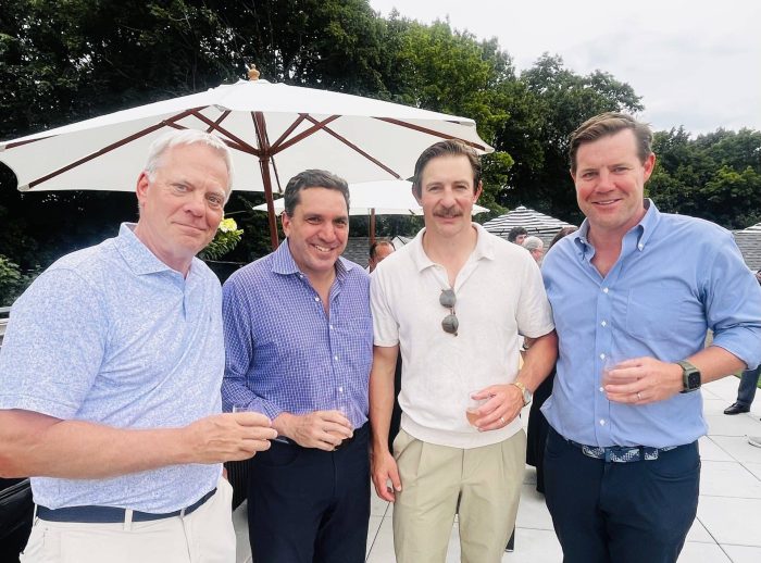 Griff Harris Jr., Michael Imbrogno, Mitch Kidd and Scott Lumby at the memorable event sponsored by The First Bank of Greenwich that was held last Tuesday to celebrate the arrival of the stunning 100 East luxury residential and retail building in Cos Cob. (Photo by Liz Leamy)