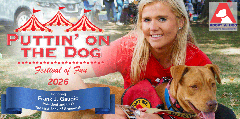 A young woman smiles and hugs a dog wearing an "Adopt Me" vest. There is an overlay of the text "Puttin' On The Dog Festival of Fun 2026 Honoring Frank J. Gaudio, President and CEO The First Bank of Greenwich". The Adopt-A-Dog logo is in the upper right corner of the image.
